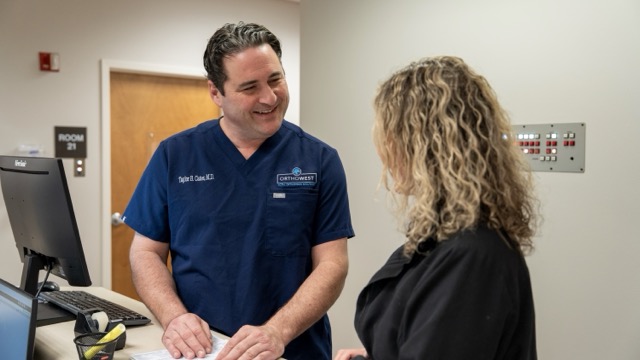 Doctor talking to patient